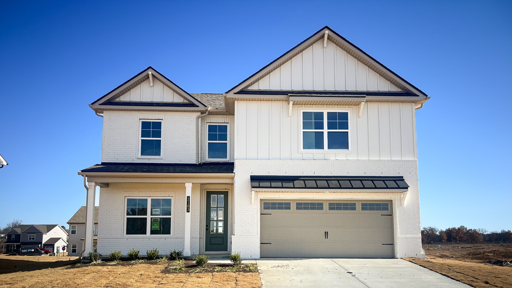 2103 Madelyn Branch Road Columbia, TN 38401 - Photo 1 of 37 a front view of a house with a yard