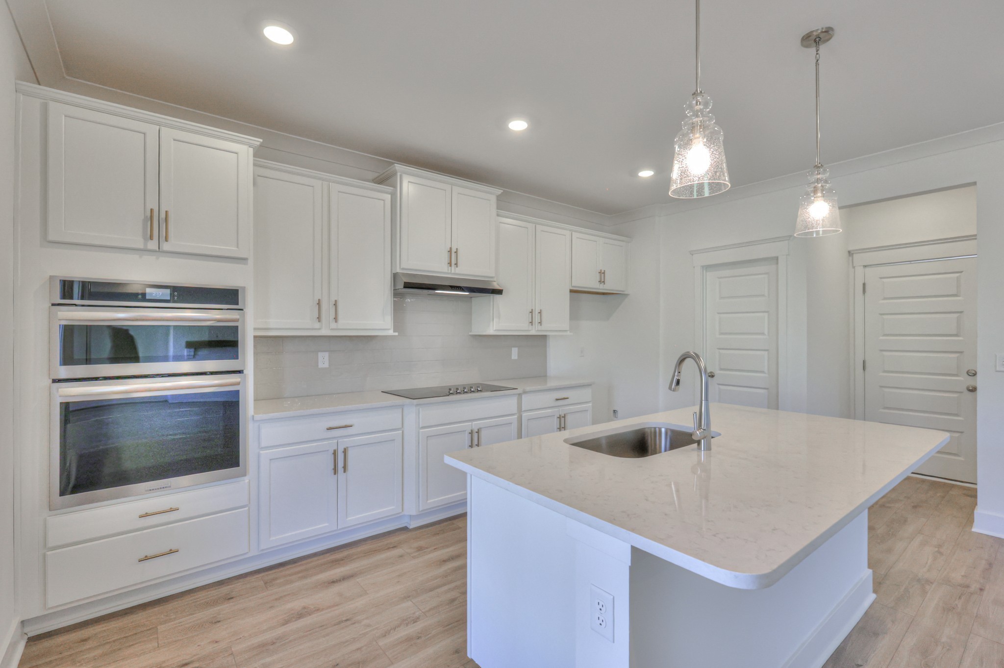 2103 Madelyn Branch Road Columbia, TN 38401 - Photo 10 of 37 a kitchen with kitchen island a sink appliances and cabinets