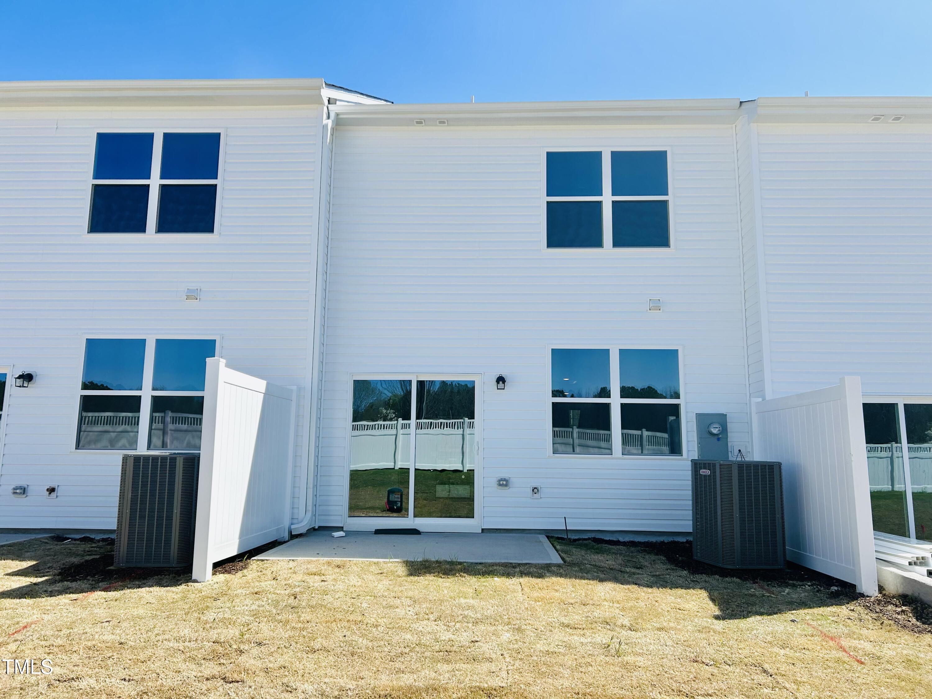 130 South Chubb Ridge Clayton, NC 27520 - Photo 26 of 32 a front view of a house with a yard