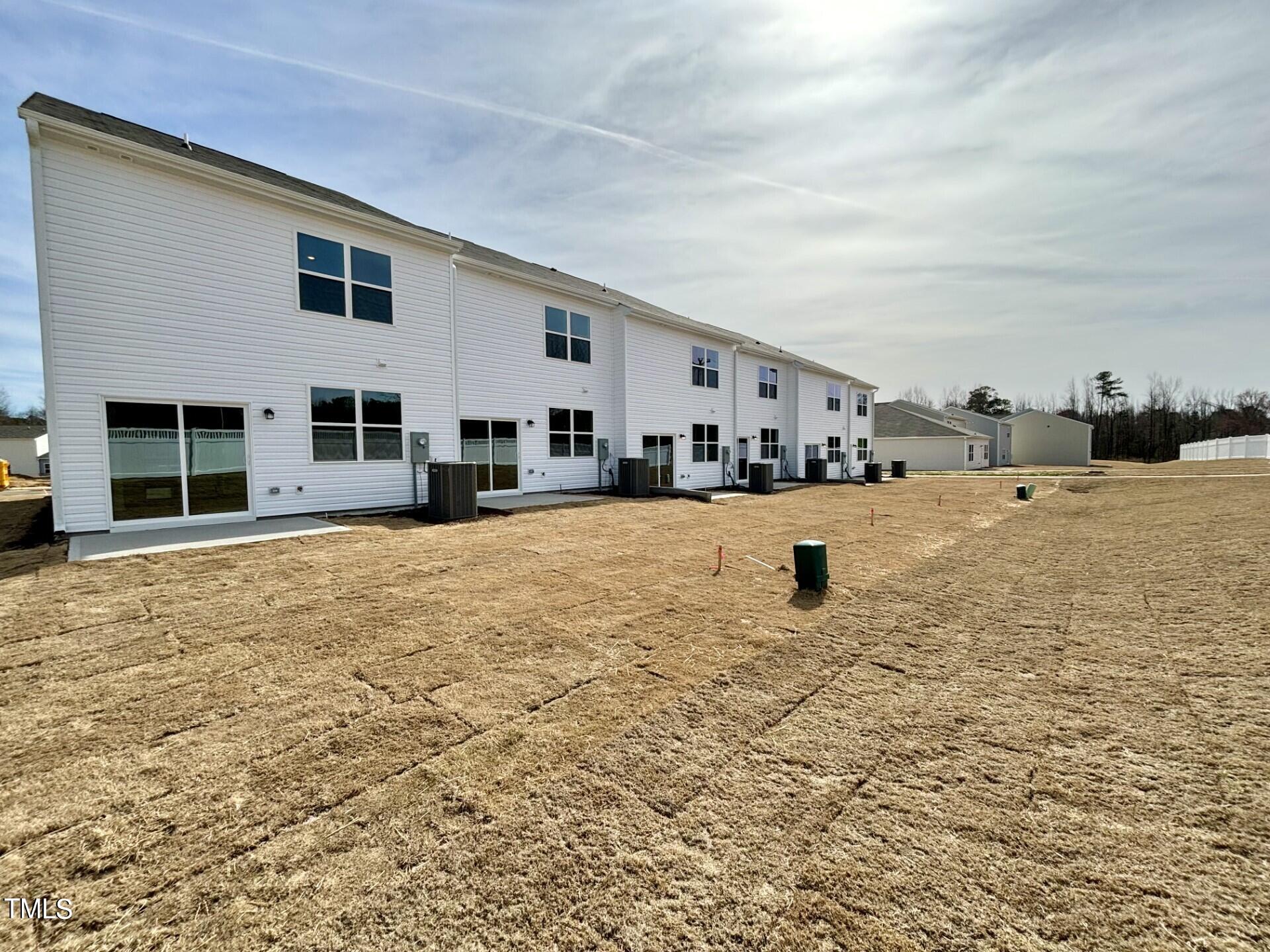 130 South Chubb Ridge Clayton, NC 27520 - Photo 28 of 32 a view of a house with a yard