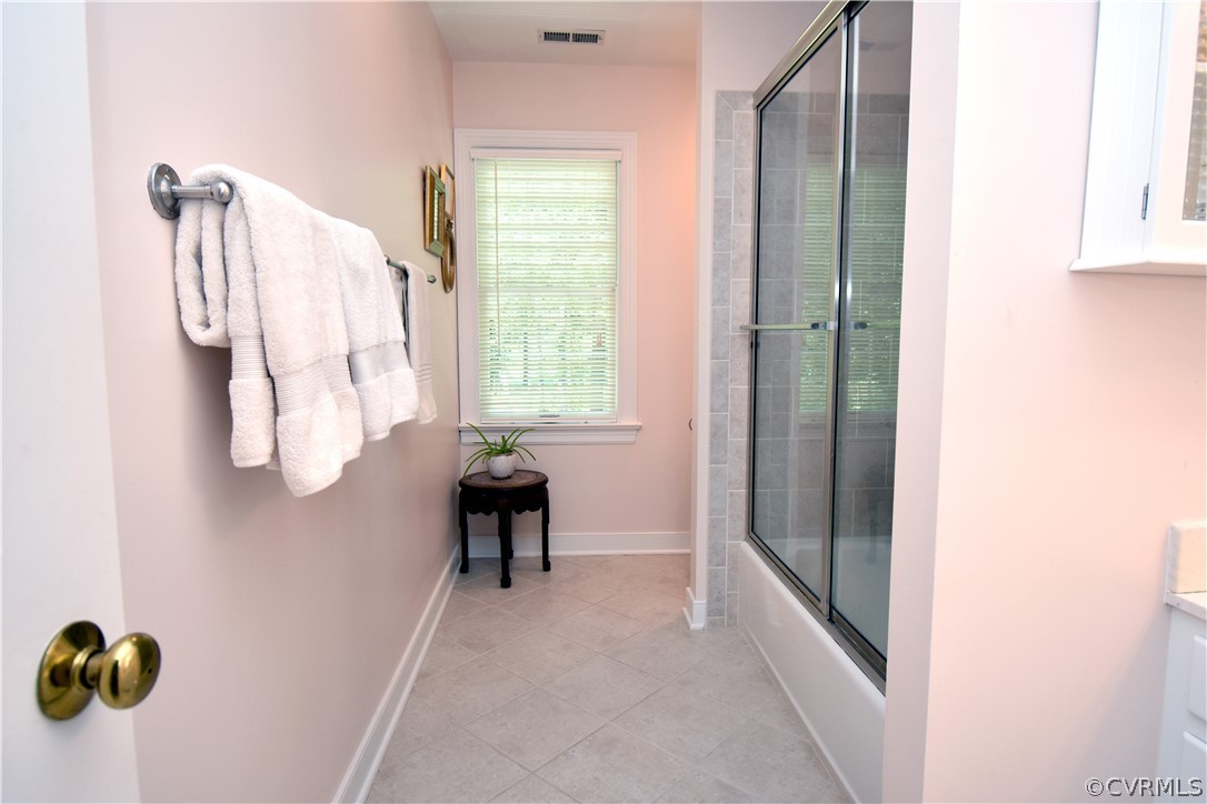 8331 Cherokee Road Richmond, VA 23235 - Photo 27 of 47 a view of entryway with furniture and a window