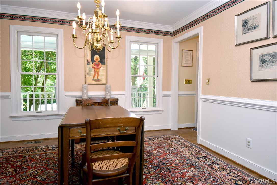 8331 Cherokee Road Richmond, VA 23235 - Photo 7 of 47 a living room with furniture and a window