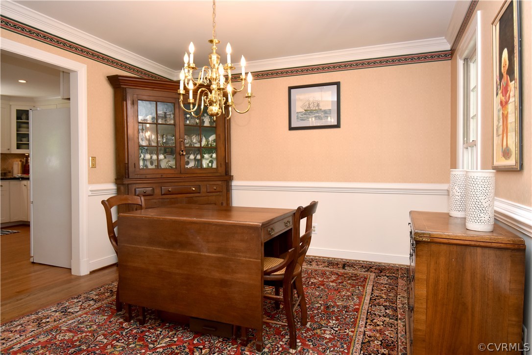 8331 Cherokee Road Richmond, VA 23235 - Photo 8 of 47 a dining room with furniture and window