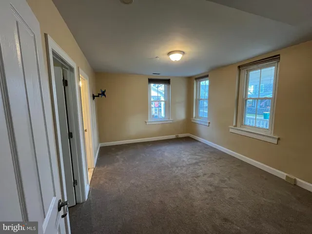 a bathroom with a shower and a bath tub