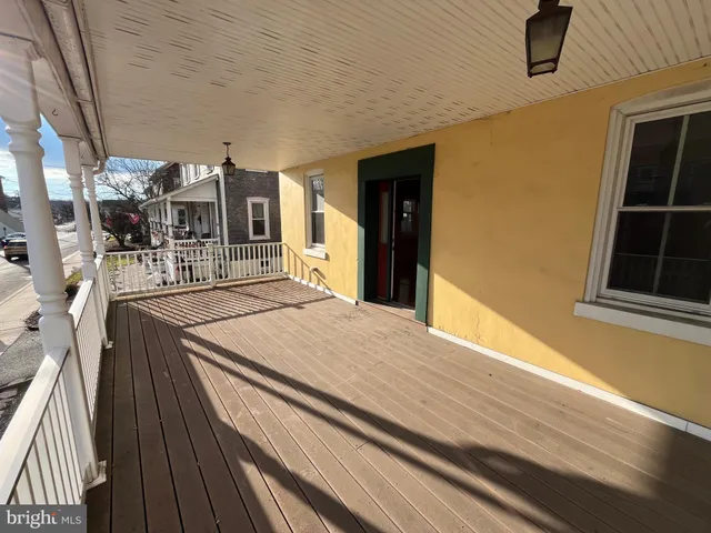 a view of a house with a porch