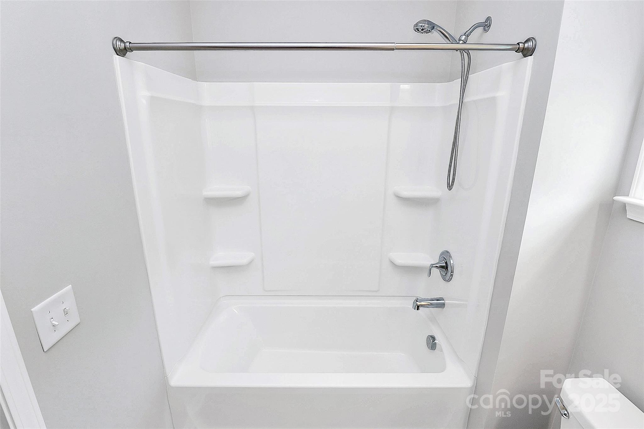 5149 Samoa Ridge Drive Lancaster, SC 29720 - Photo 11 of 40 a bathroom with a shower and a bath tub