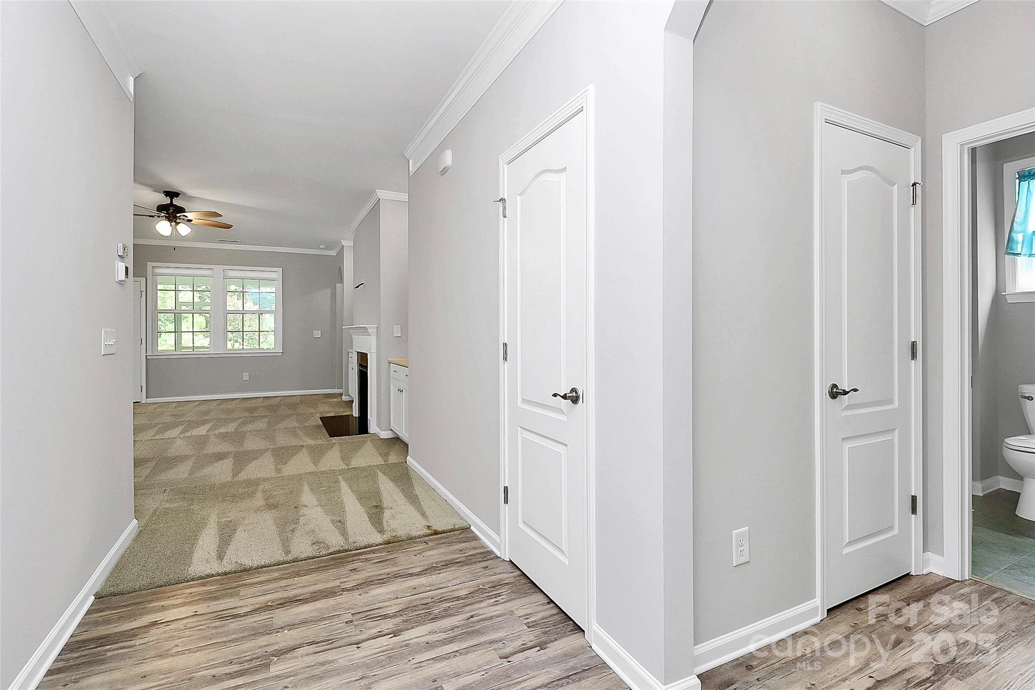 5149 Samoa Ridge Drive Lancaster, SC 29720 - Photo 12 of 40 a view of a bedroom with wooden floor and windows
