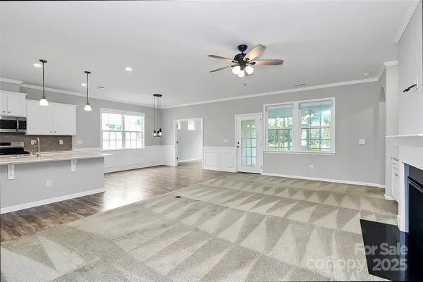 a view of an empty room and window