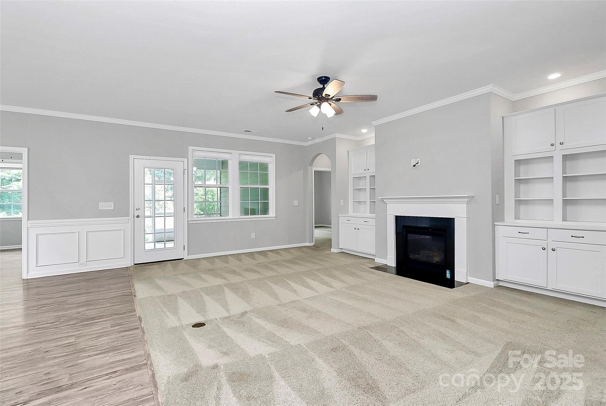 5149 Samoa Ridge Drive Lancaster, SC 29720 - Photo 15 of 40 a view of an empty room with a fireplace and a window