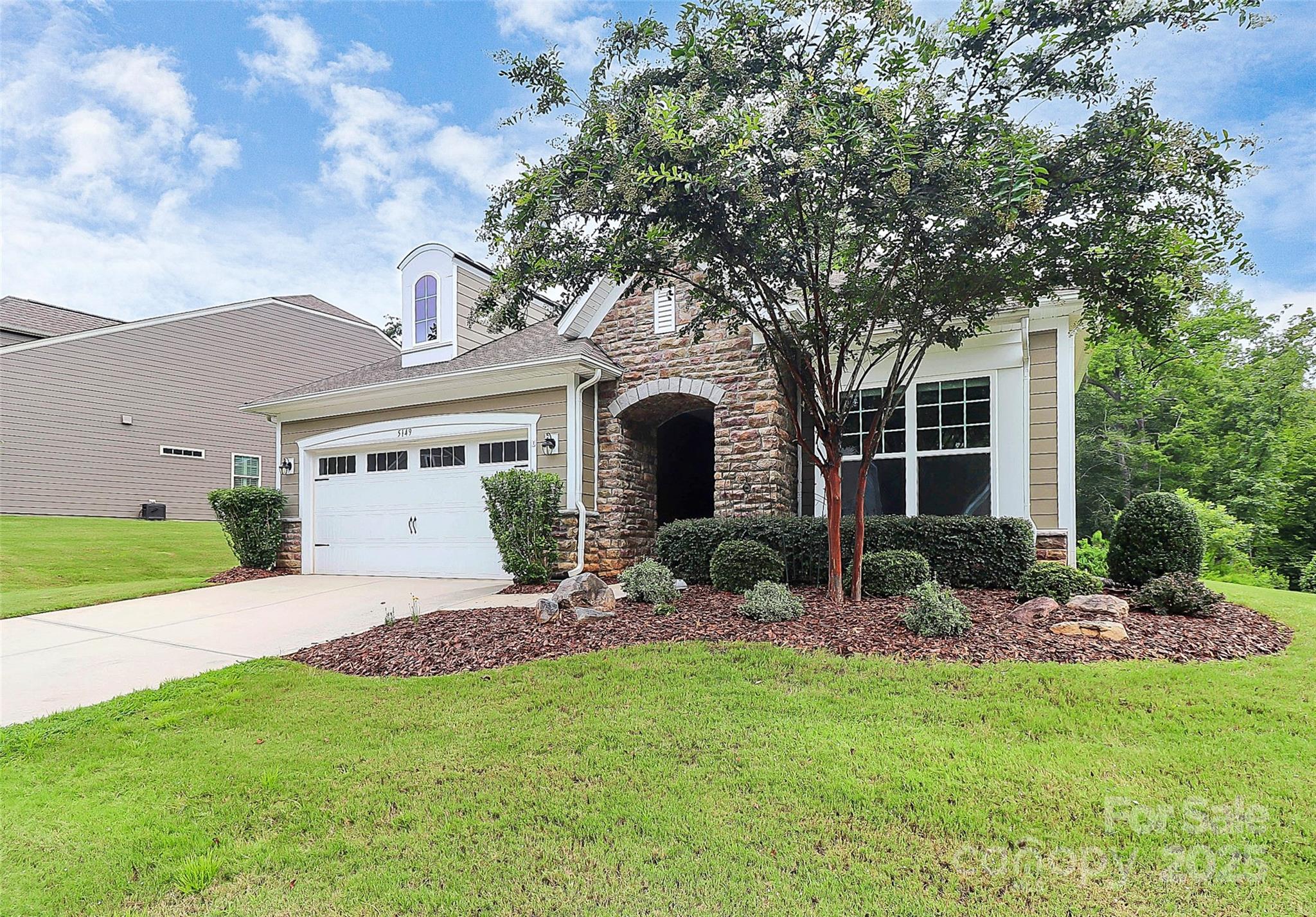 5149 Samoa Ridge Drive Lancaster, SC 29720 - Photo 2 of 40 a front view of a house with garden