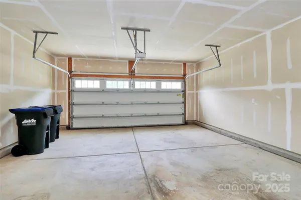 an aerial view of residential house with outdoor space and street view