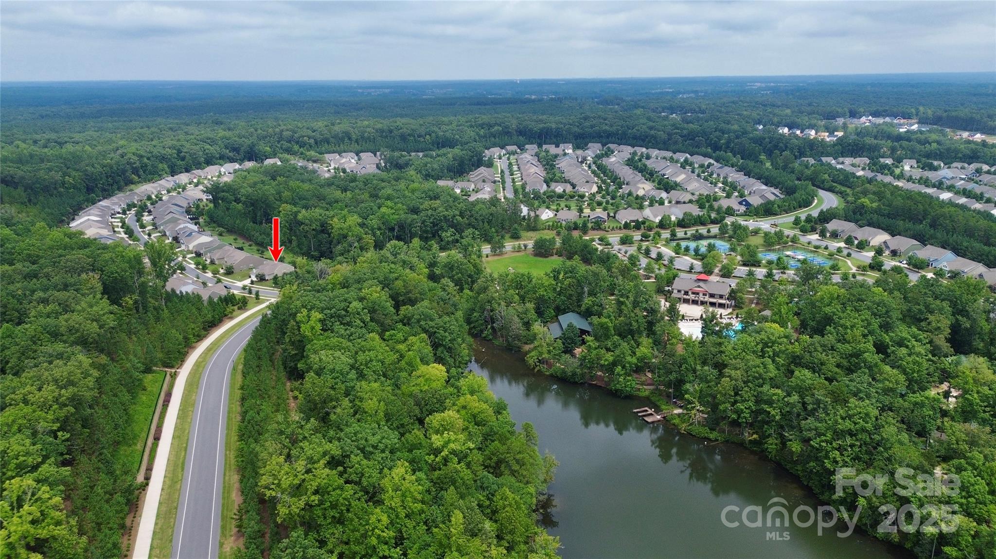 5149 Samoa Ridge Drive Lancaster, SC 29720 - Photo 40 of 40 an aerial view of a house with a yard and lake view
