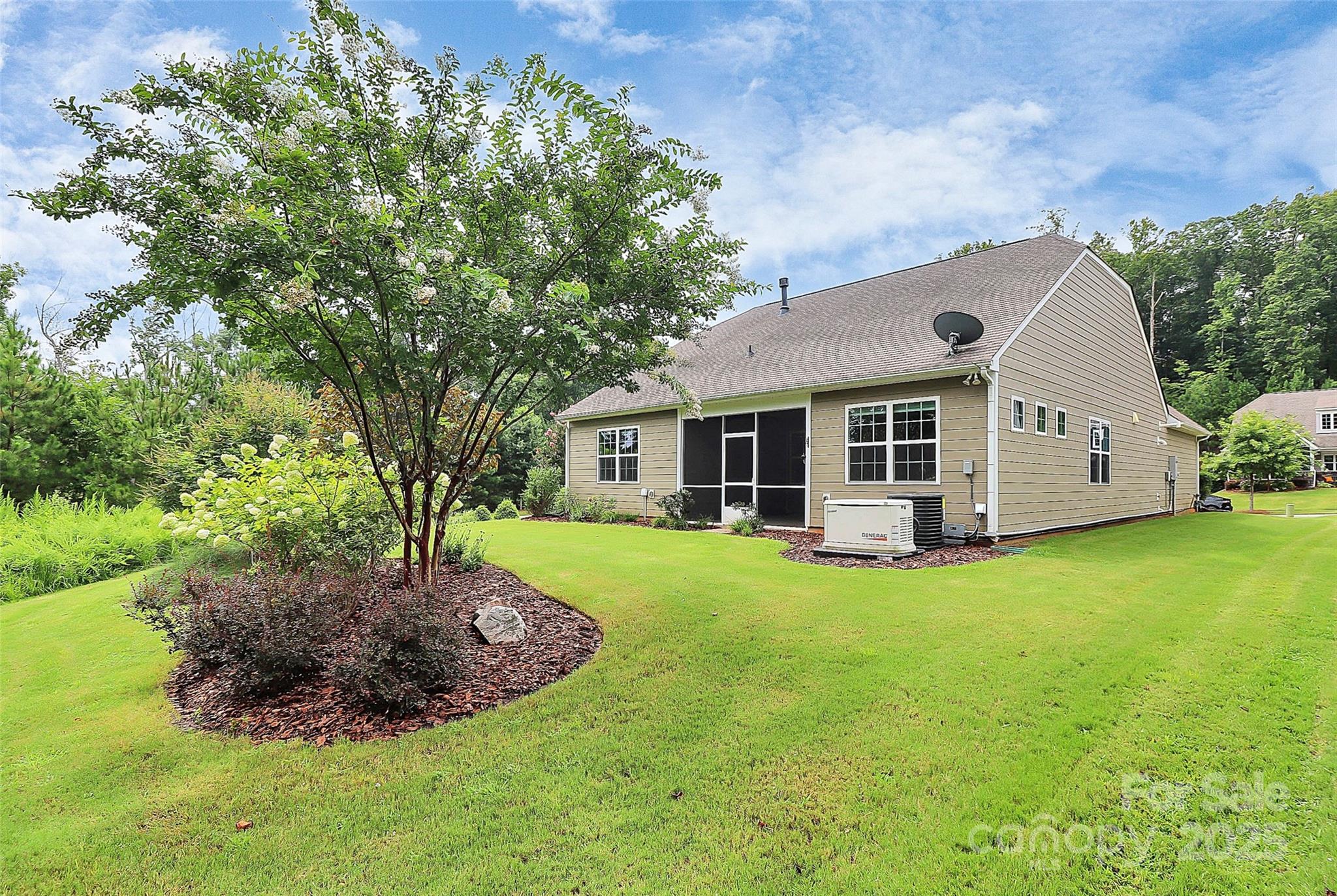 5149 Samoa Ridge Drive Lancaster, SC 29720 - Photo 6 of 40 a front view of a house with a garden