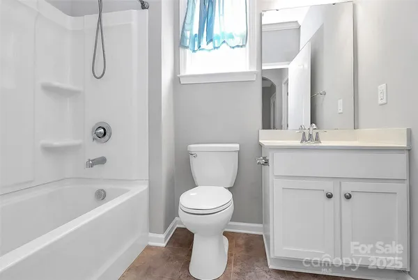 a bathroom with a sink a toilet and a bathtub
