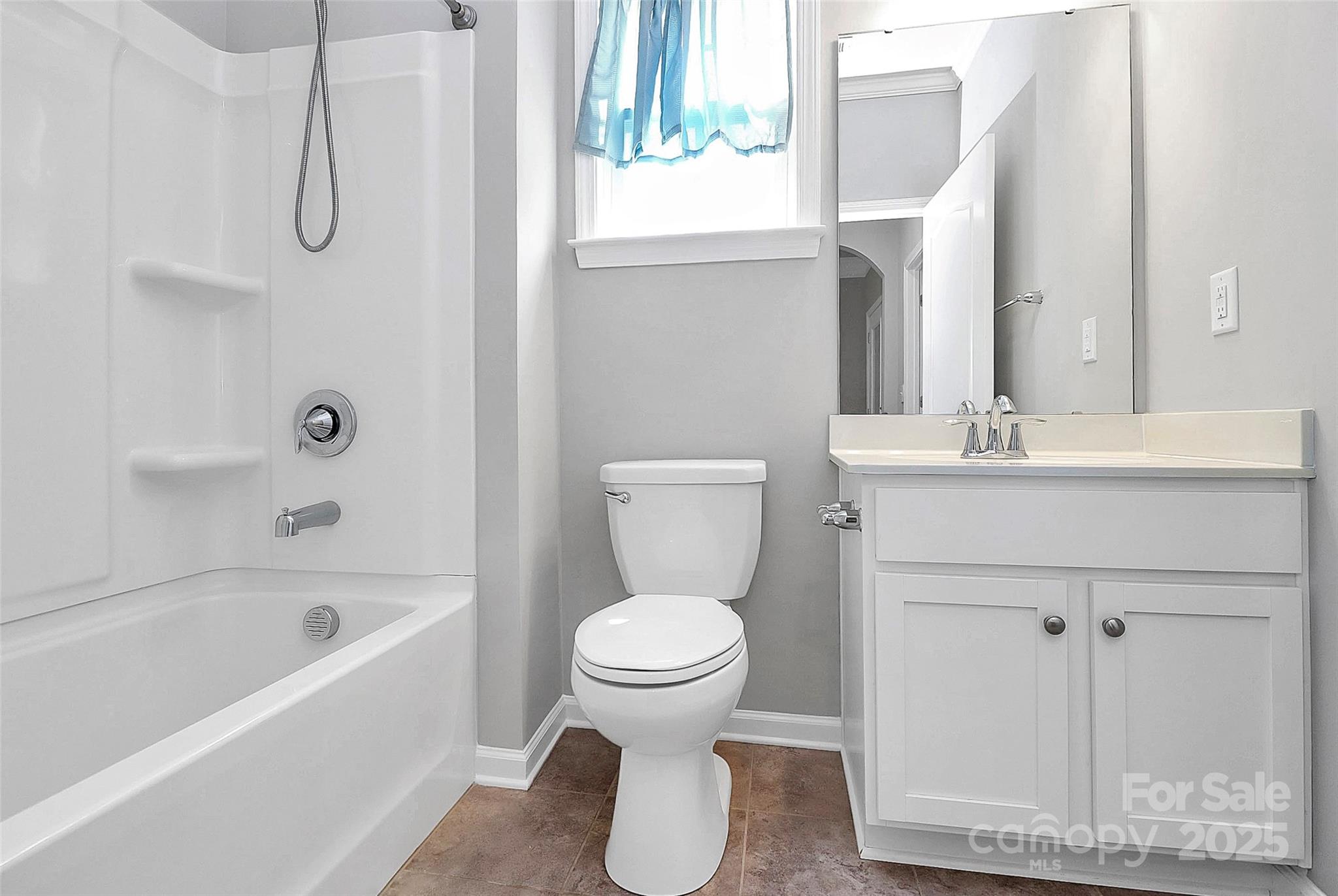 5149 Samoa Ridge Drive Lancaster, SC 29720 - Photo 10 of 40 a bathroom with a sink a toilet and a bathtub