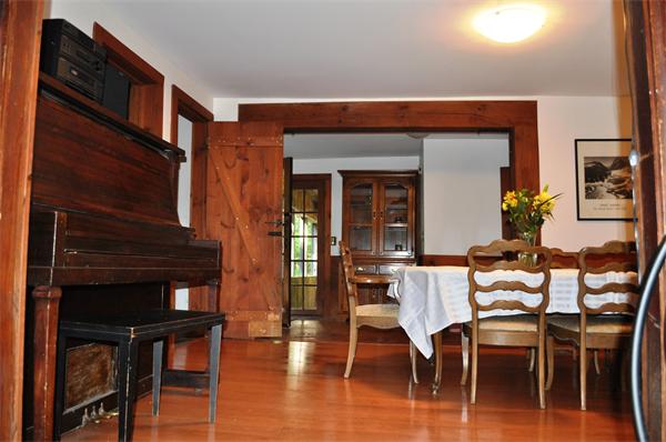 4 Number 6 Road Leverett, MA 01054 - Photo 5 of 20 a view of a dining room with furniture and wooden floor
