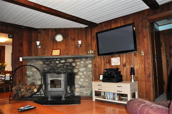 4 Number 6 Road Leverett, MA 01054 - Photo 7 of 20 a living room with furniture and a flat screen tv