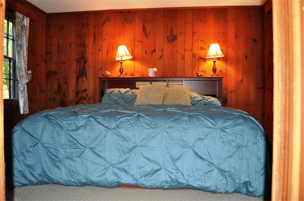 4 Number 6 Road Leverett, MA 01054 - Photo 8 of 20 a bed sitting in a bedroom next to a window and a window