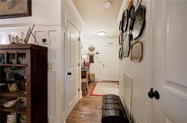 a bathroom with a sink vanity mirror and toilet