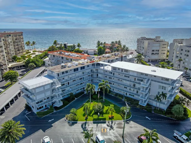 a view of a chairs and table in the patio