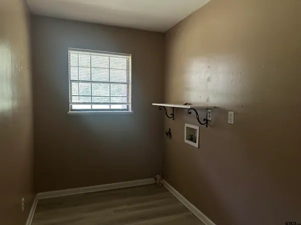 a view of small space with racks on the wall