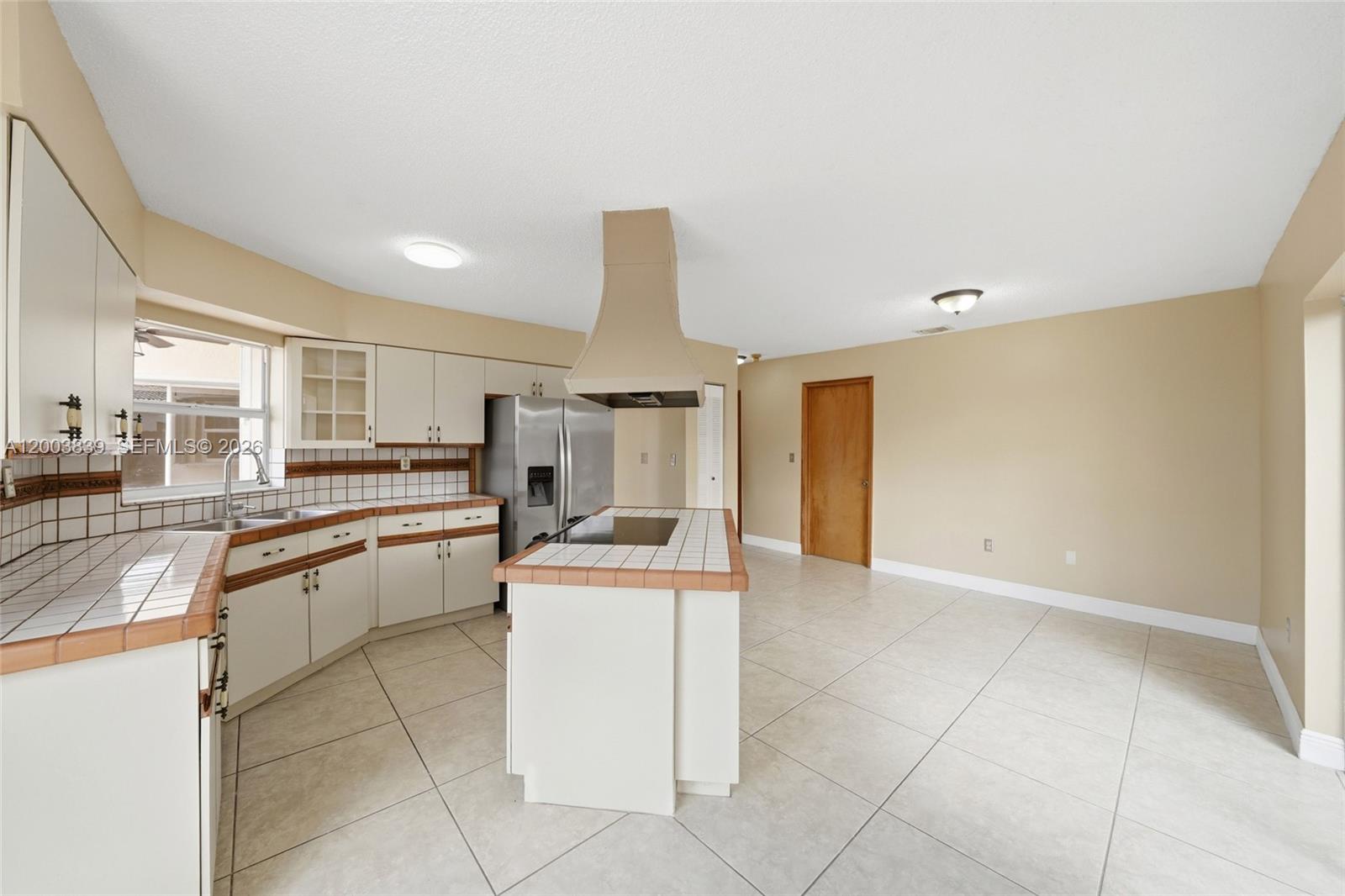631 Southwest 88th Court Miami, FL 33174 - Photo 14 of 28 a kitchen with a sink and cabinets