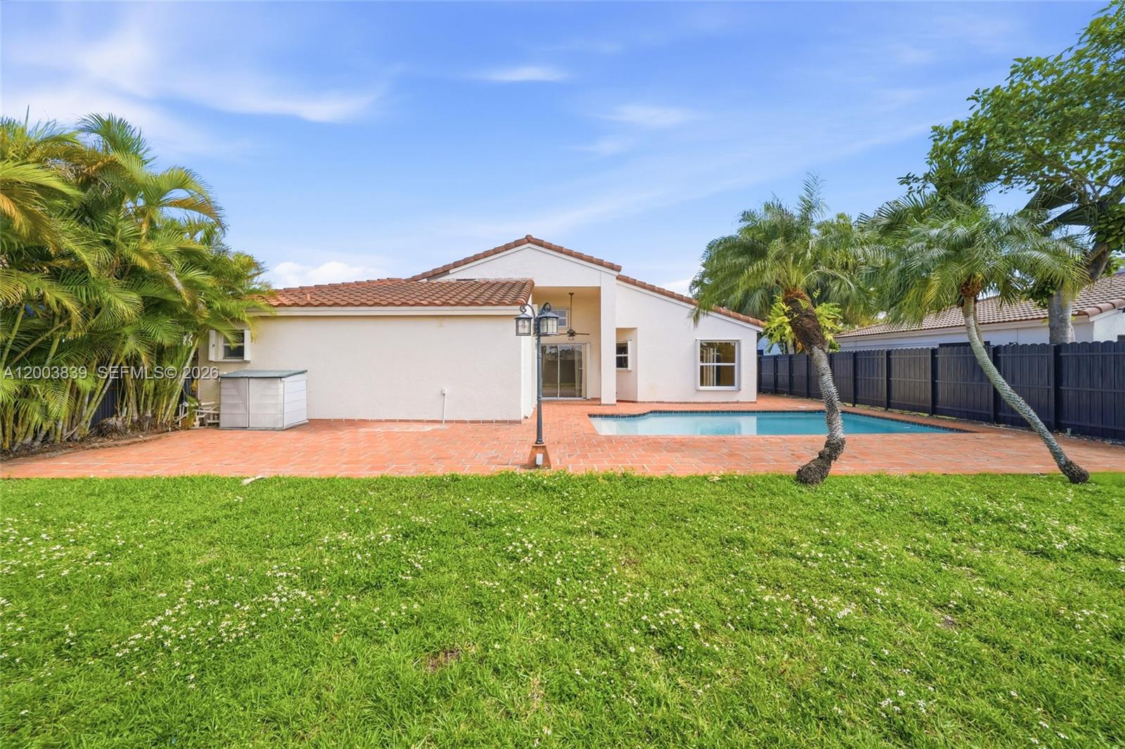 631 Southwest 88th Court Miami, FL 33174 - Photo 18 of 28 a front view of a house with a yard