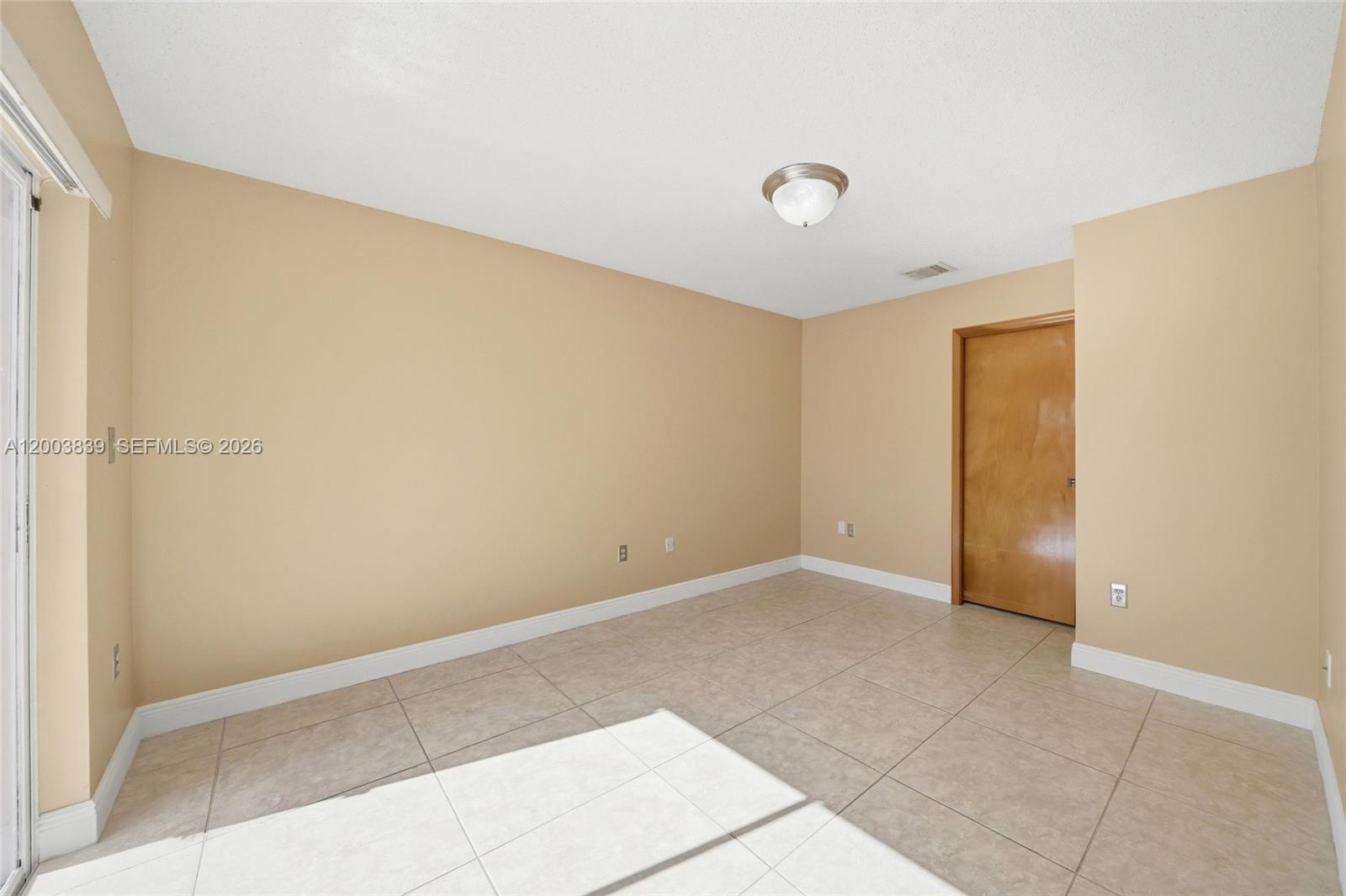 631 Southwest 88th Court Miami, FL 33174 - Photo 20 of 28 a view of an empty room