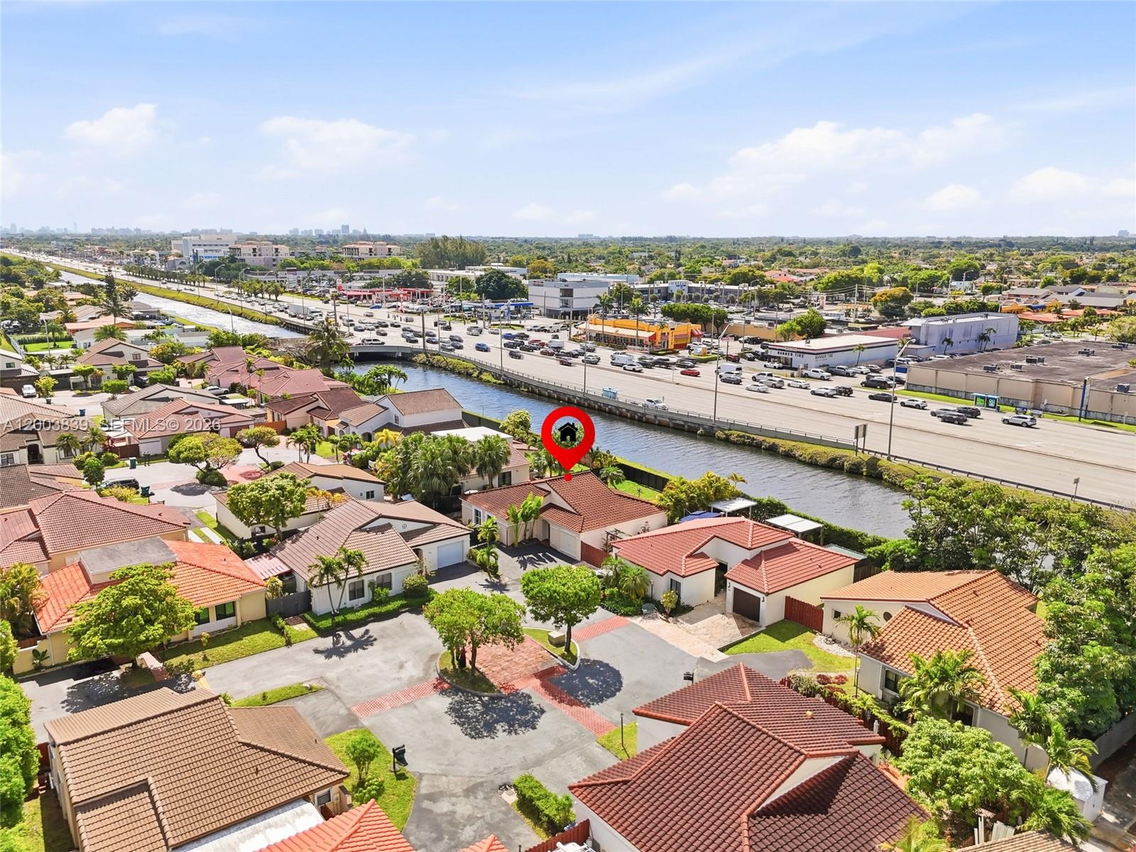 631 Southwest 88th Court Miami, FL 33174 - Photo 2 of 28 an aerial view of residential houses with outdoor space