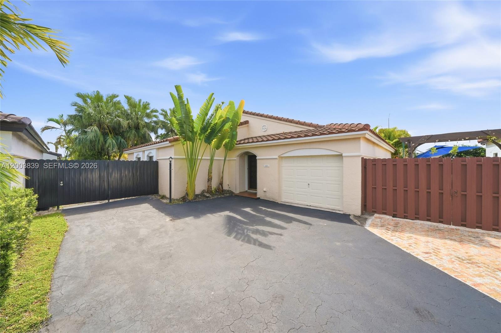 631 Southwest 88th Court Miami, FL 33174 - Photo 6 of 28 a view of a house with a garage