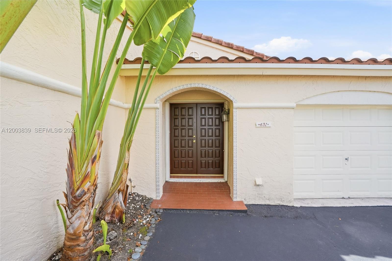 631 Southwest 88th Court Miami, FL 33174 - Photo 7 of 28 a view of front door of house