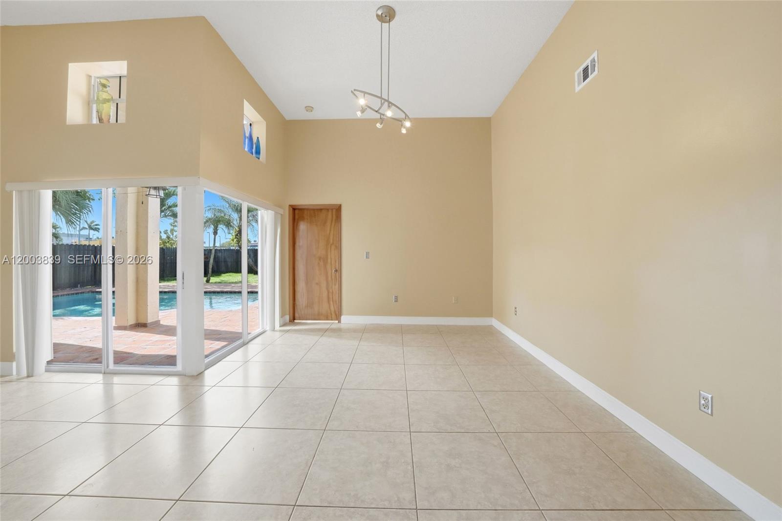631 Southwest 88th Court Miami, FL 33174 - Photo 9 of 28 a view of an entryway with front door