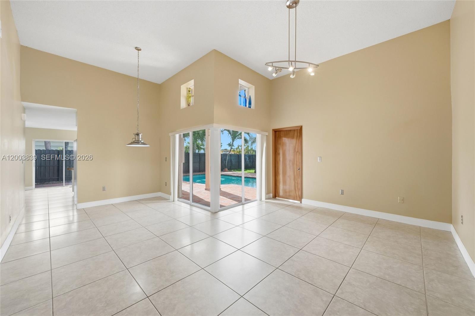 631 Southwest 88th Court Miami, FL 33174 - Photo 10 of 28 a view of an empty room with a window