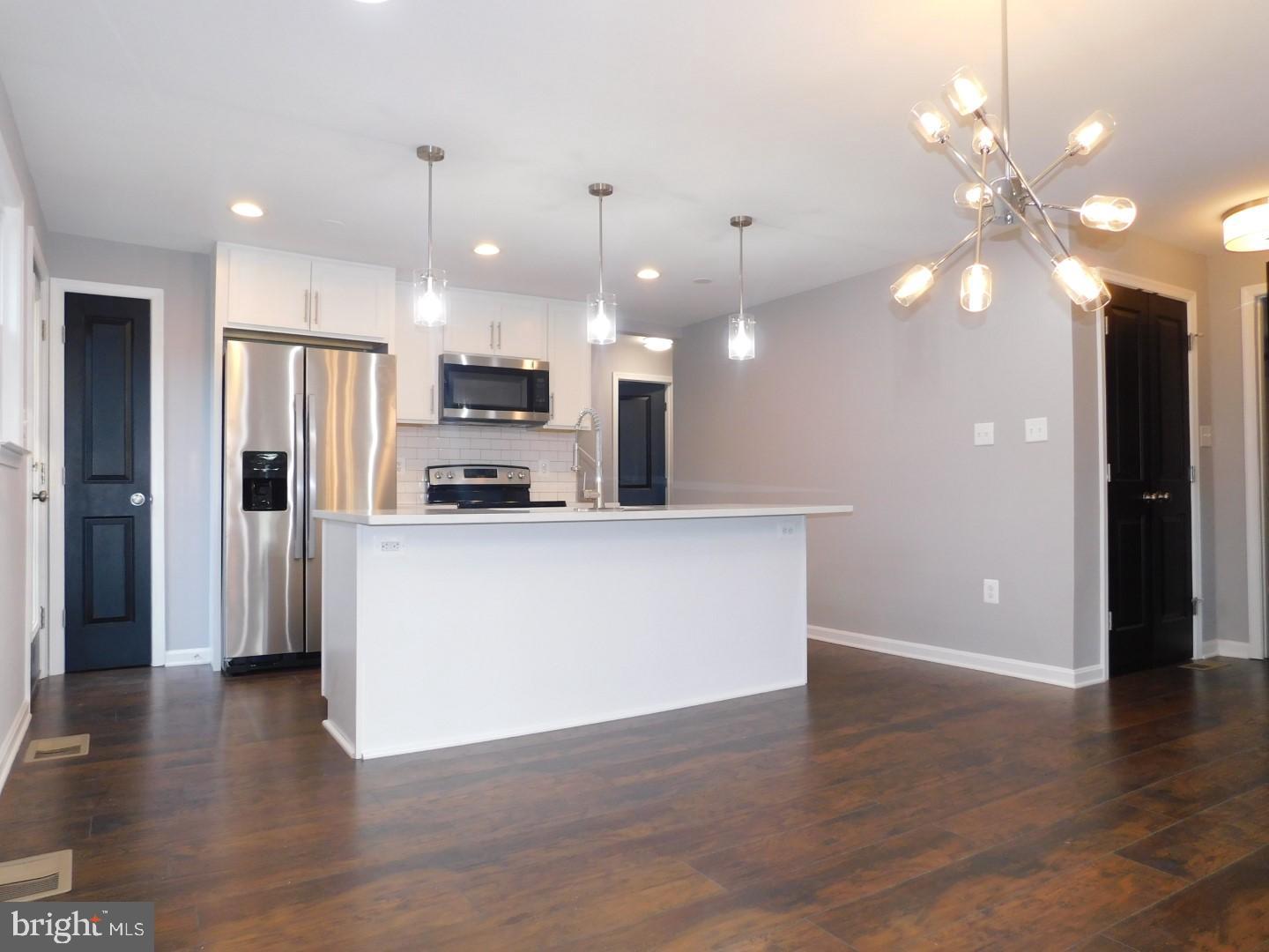 16713 Brogden Road Spencerville, MD 20868 - Photo 1 of 24 Living Room / Kitchen Combo