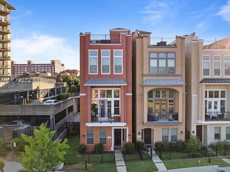 1390 Arch Place Dallas, TX 75215 - Photo 1 of 1 a view of buildings with a yard