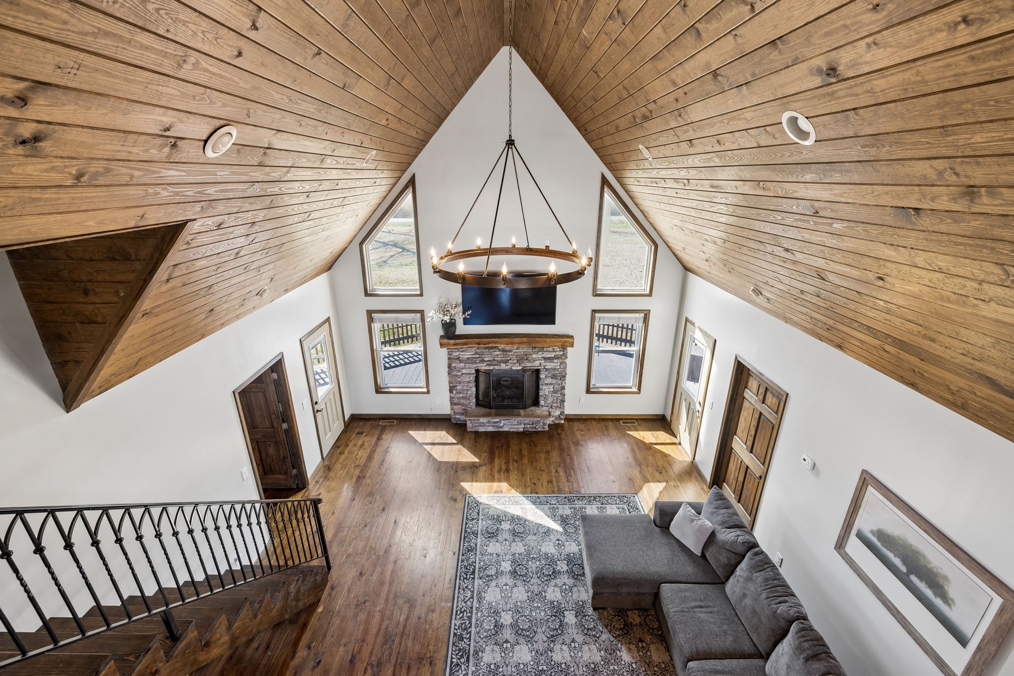 267 Switzerland Road Hohenwald, TN 38462 - Photo 49 of 98 a living room with furniture and a fireplace