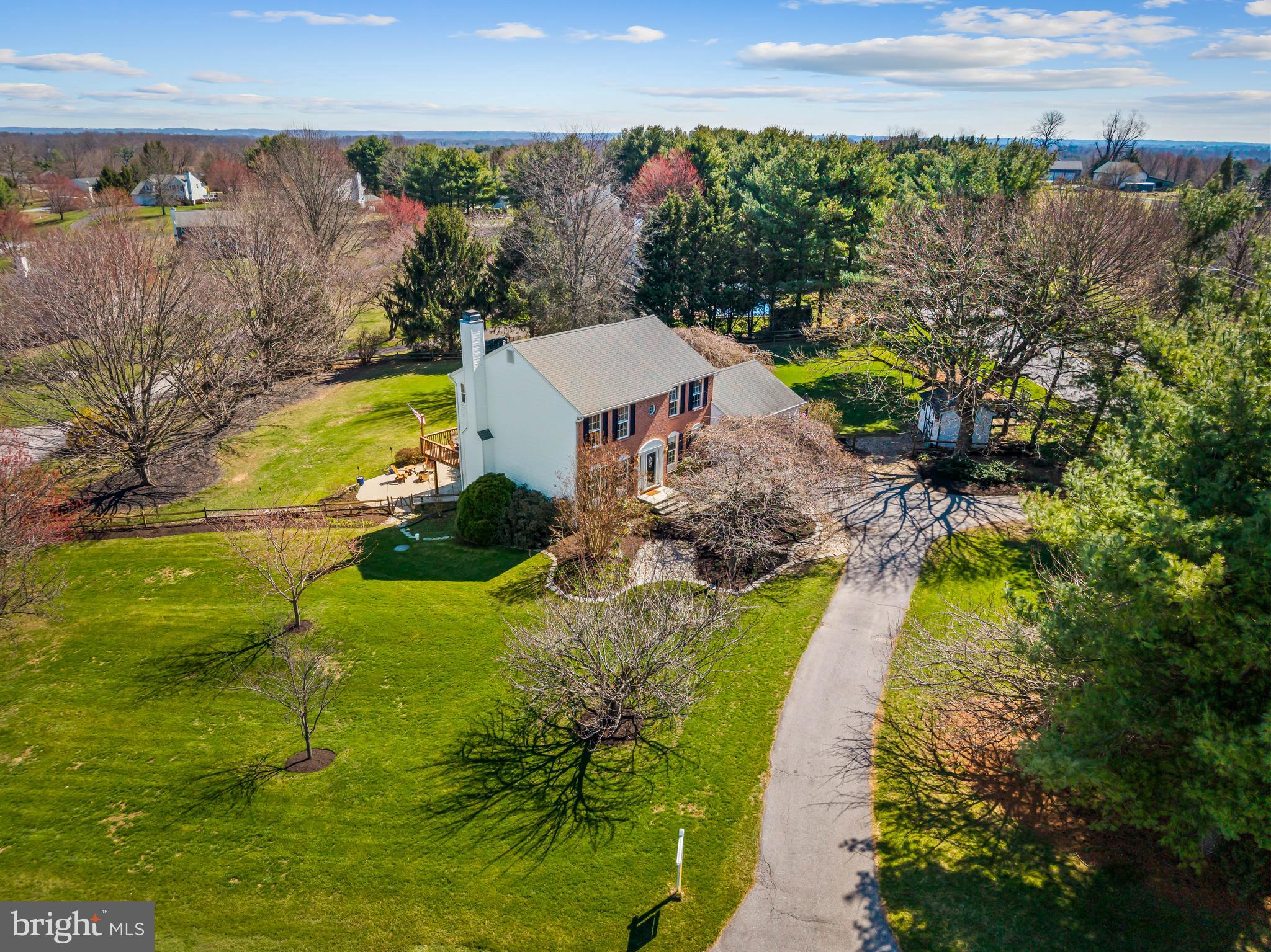 a view of a lake with a yard