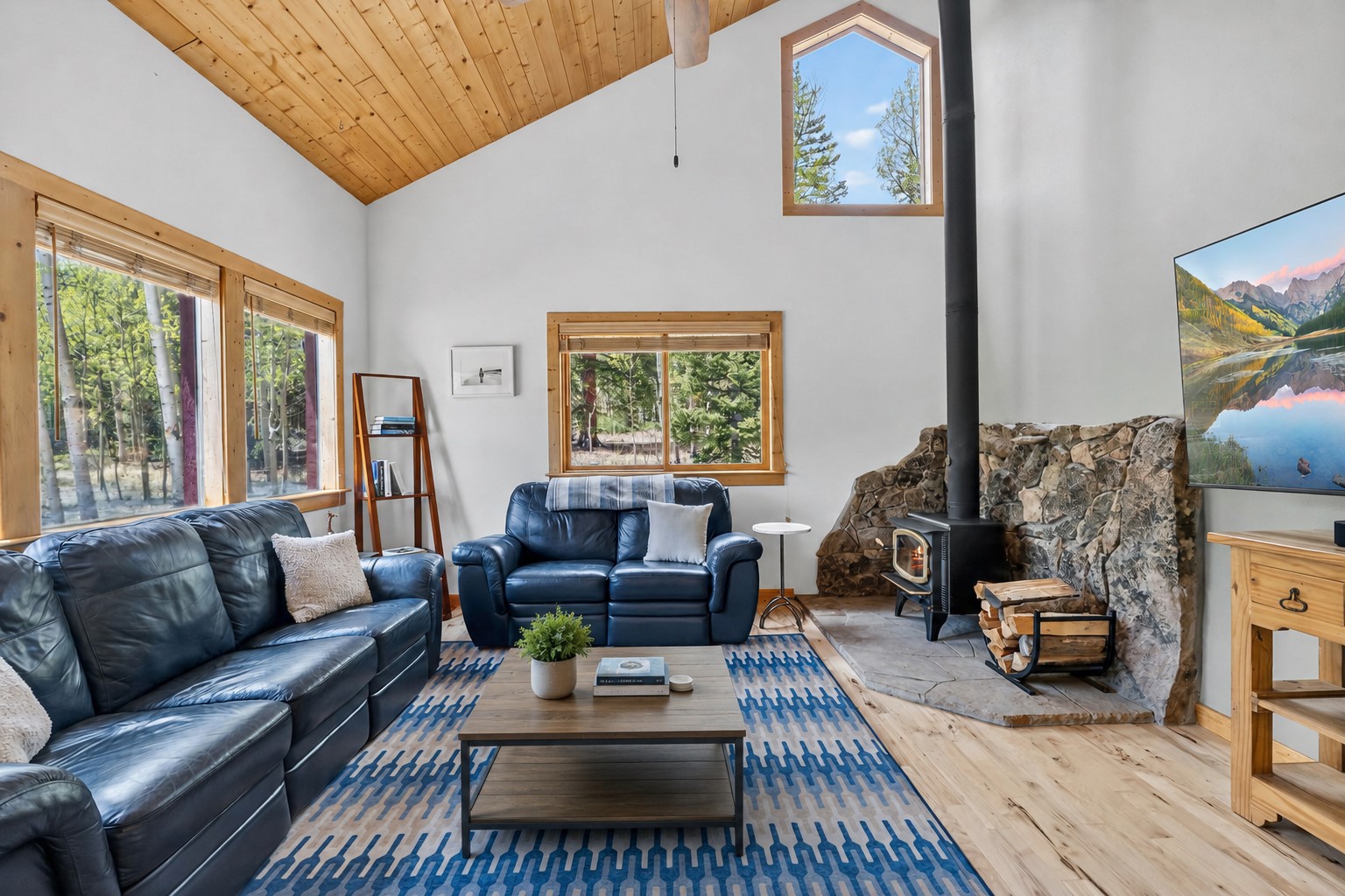 spacious light-filled living room, coffee table virutally staged