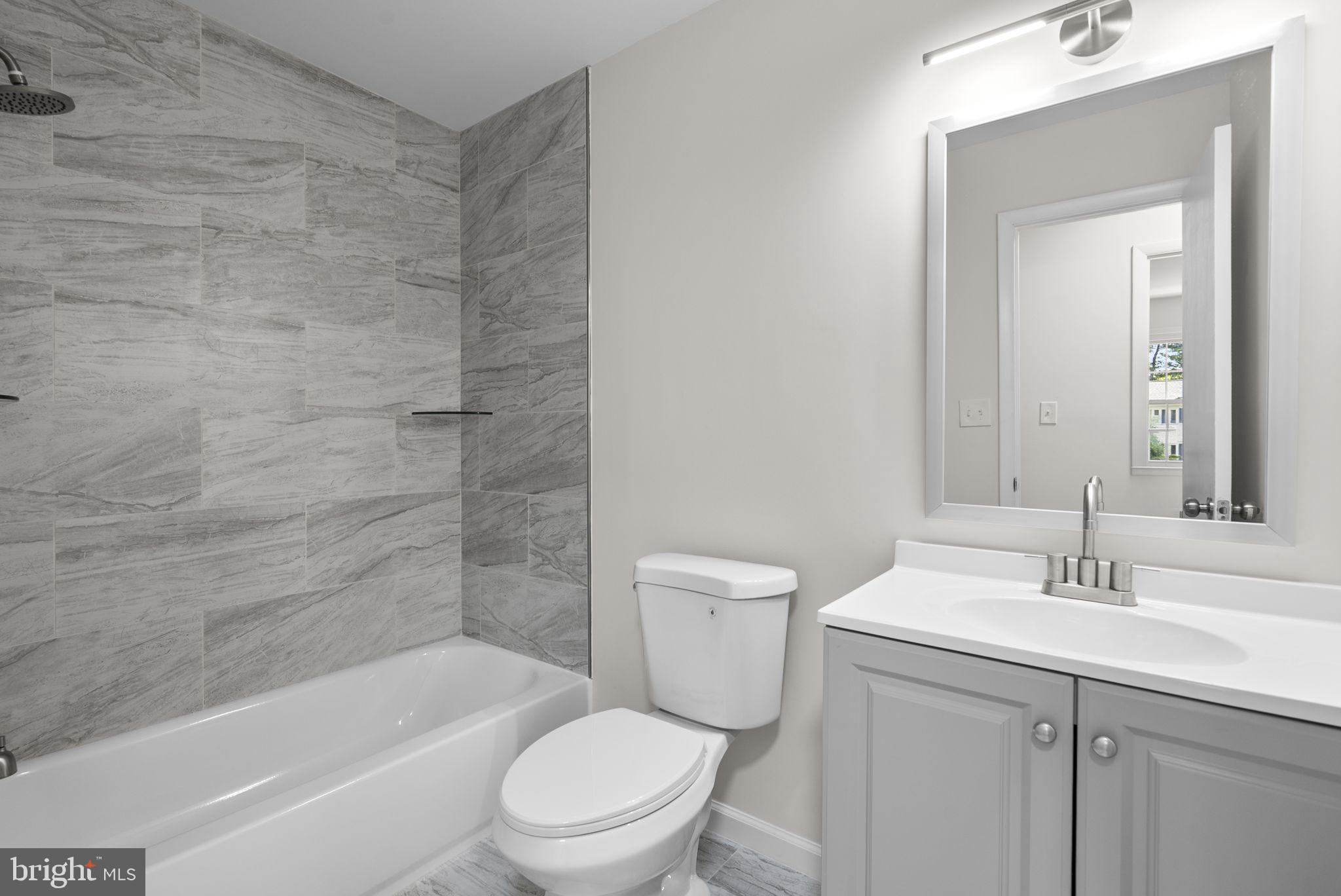 17109 Oxley Farm Road Poolesville, MD 20837 - Photo 26 of 43 Updated hall bath with tub/shower
