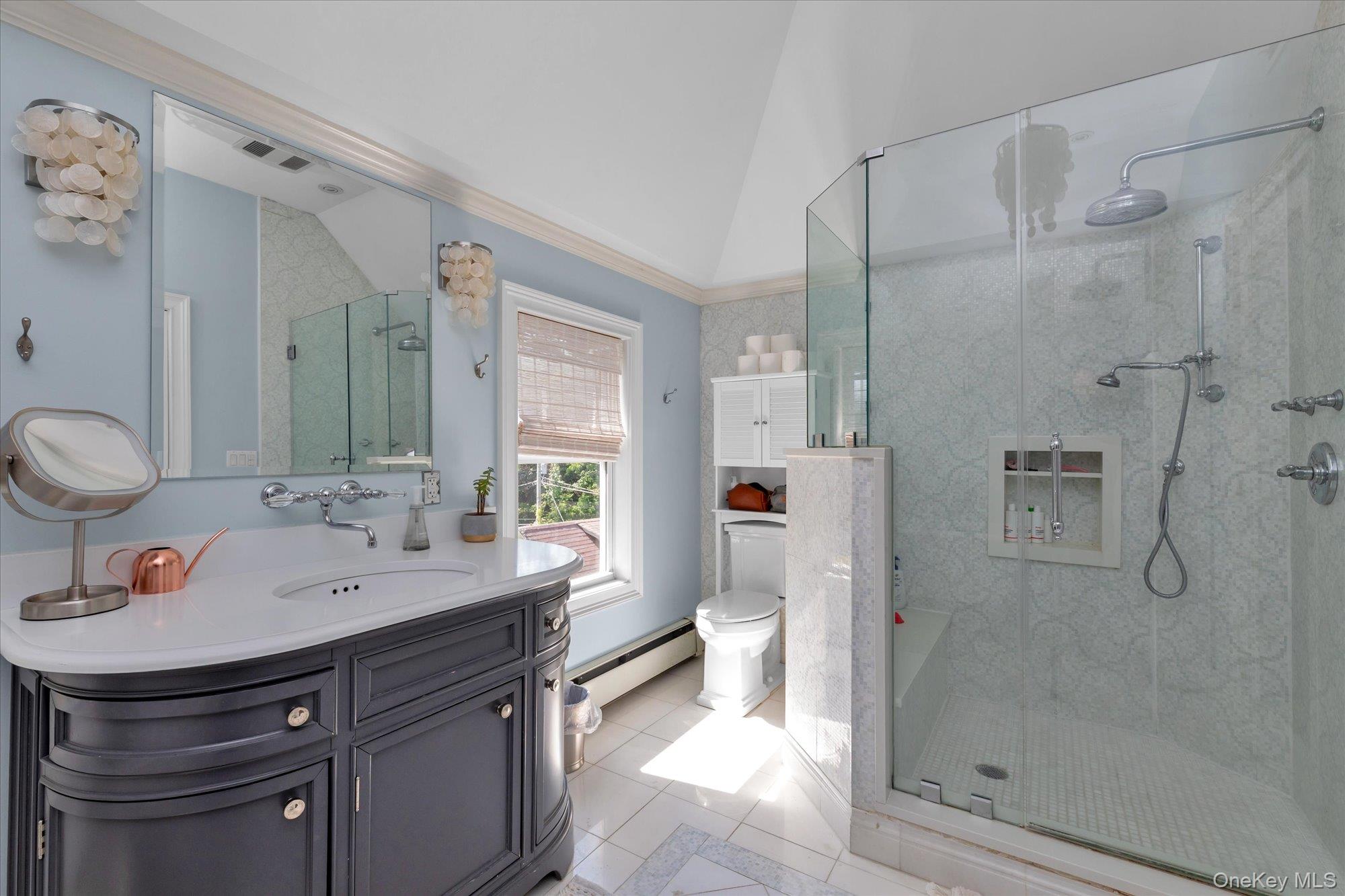 80 Skunks Misery Road Locust Valley, NY 11560 - Photo 20 of 25 a bathroom with a sink a toilet and shower