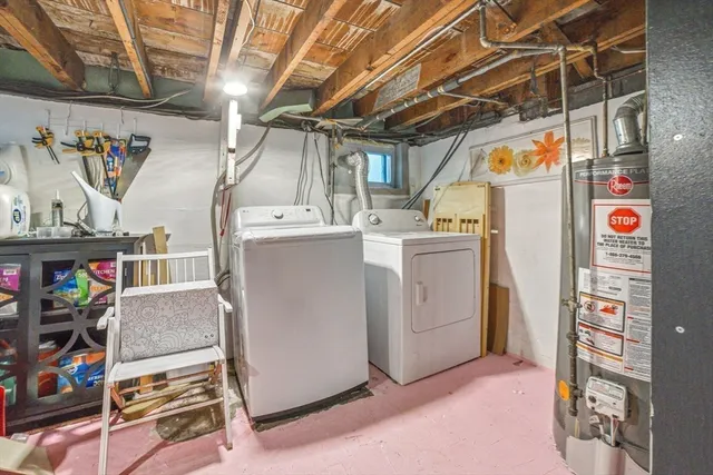 a dinning room with furniture and a flat screen tv