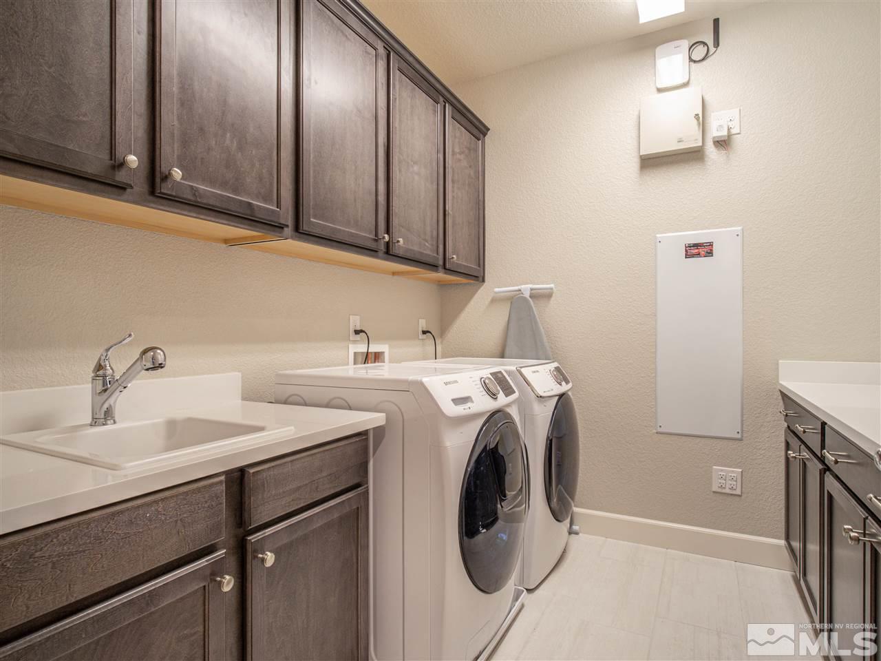 2224 Edgelands Drive Reno, NV 89521 - Photo 30 of 40 a utility room with dryer and washer