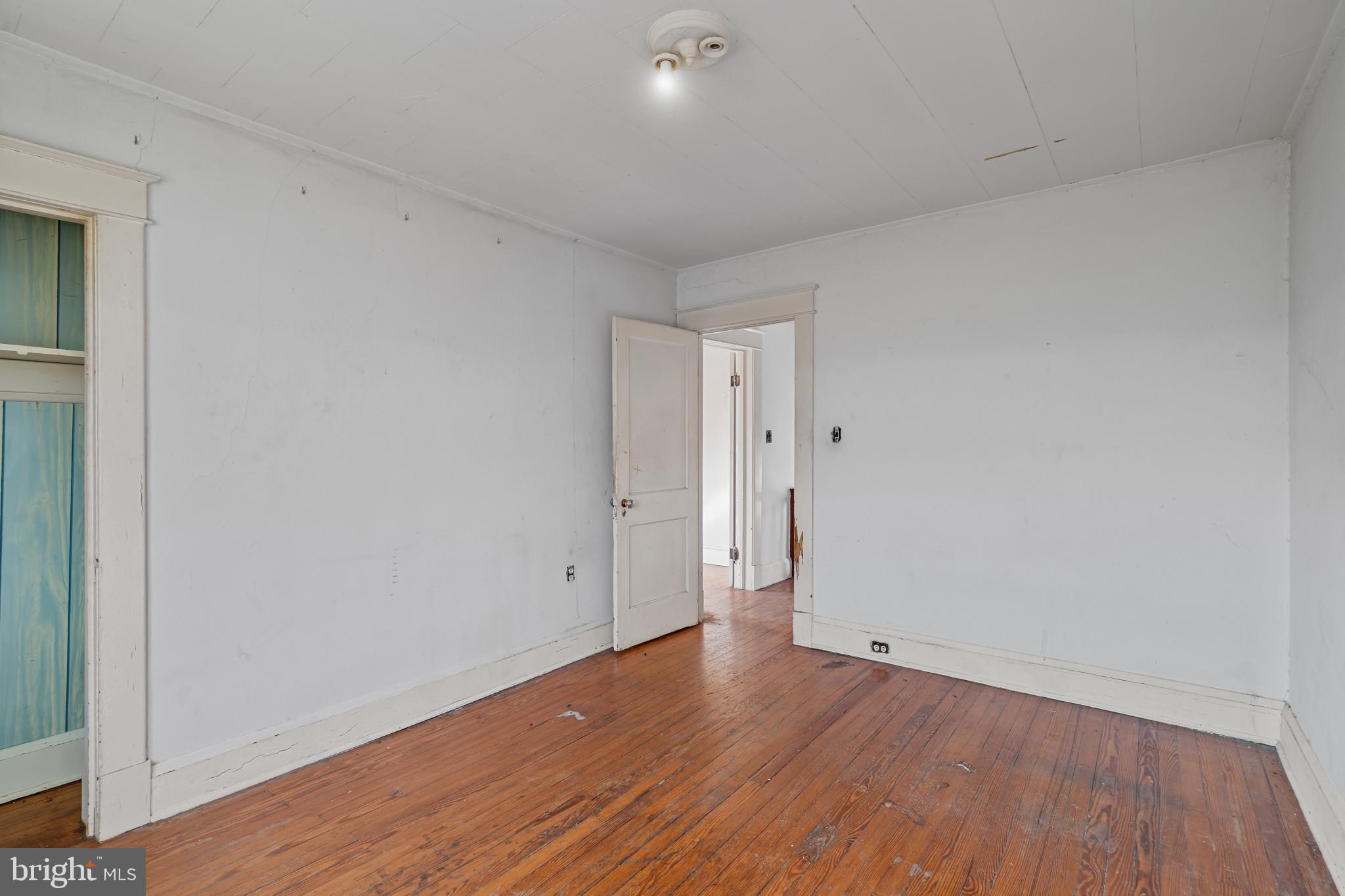 2908 Ailsa Avenue Baltimore, MD 21214 - Photo 20 of 29 a view of room with wooden floor