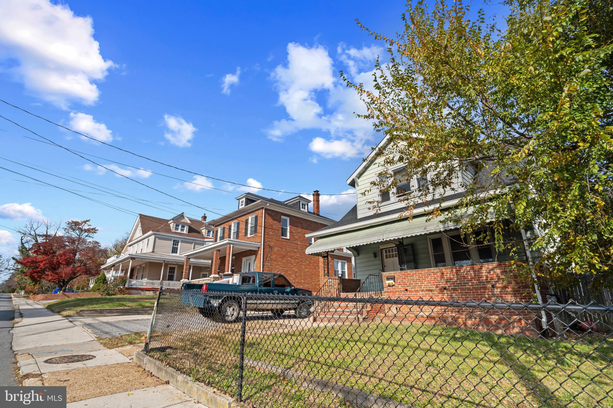 2908 Ailsa Avenue Baltimore, MD 21214 - Photo 2 of 29 a front view of a house with a yard