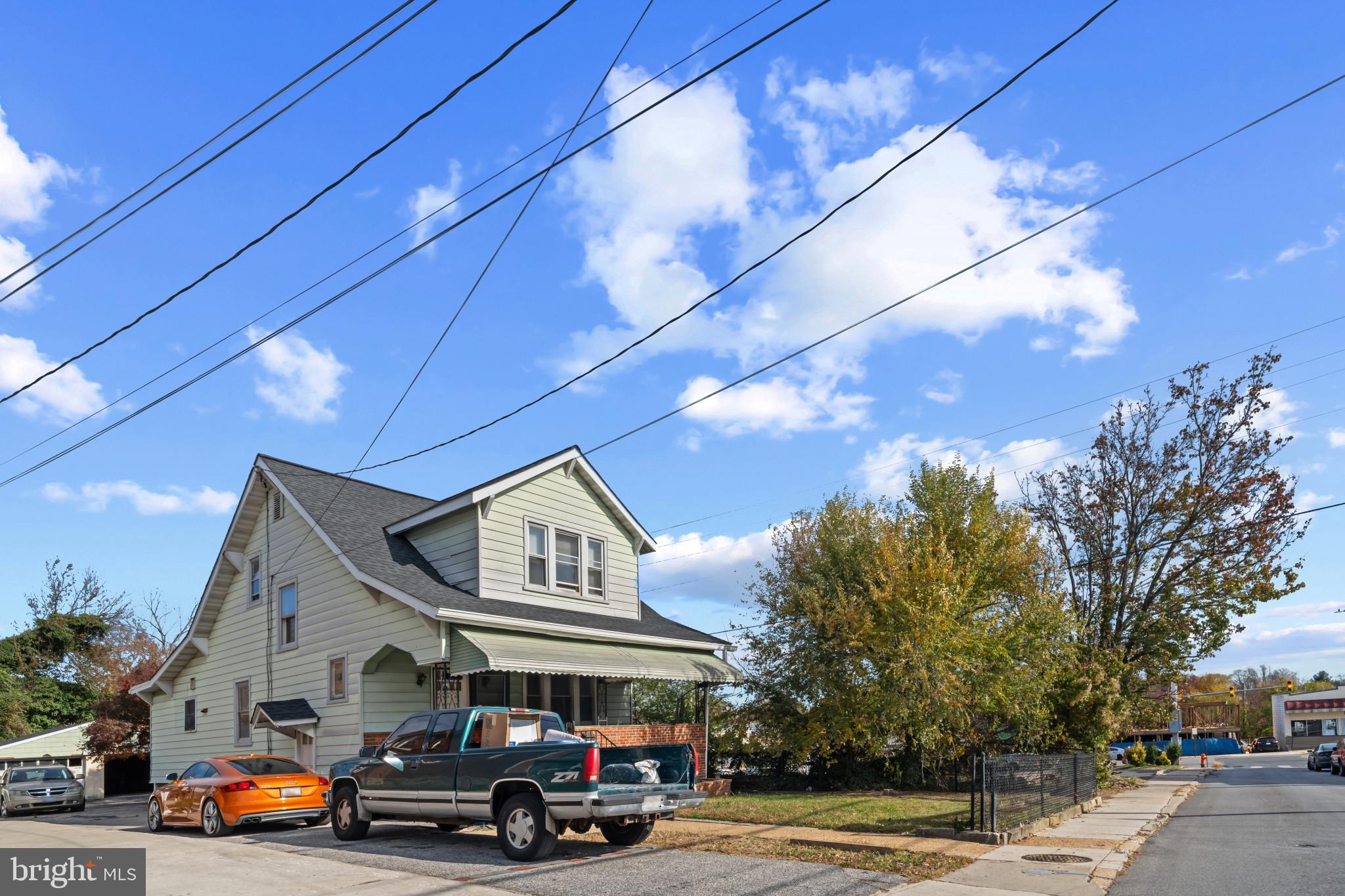 2908 Ailsa Avenue Baltimore, MD 21214 - Photo 3 of 29 a car parked in front of a building