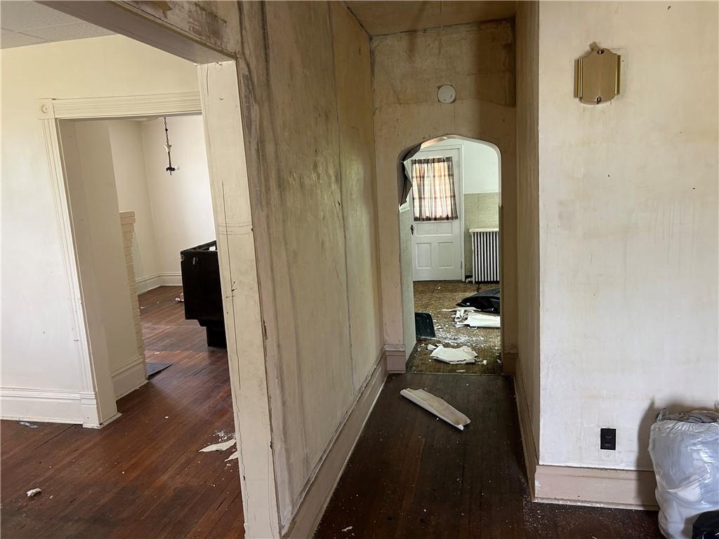 306 4th Street Monessen, PA 15062 - Photo 12 of 18 a view of a hallway to a livingroom and a couch