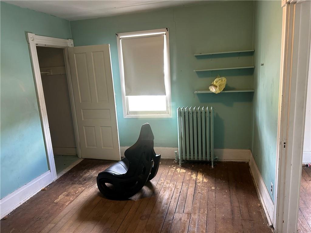 306 4th Street Monessen, PA 15062 - Photo 16 of 18 a living room with furniture and a window