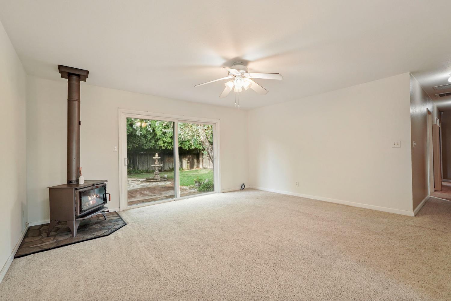 1007 Cardinal Street Lodi, CA 95240 - Photo 6 of 31 a view of an empty room with a window