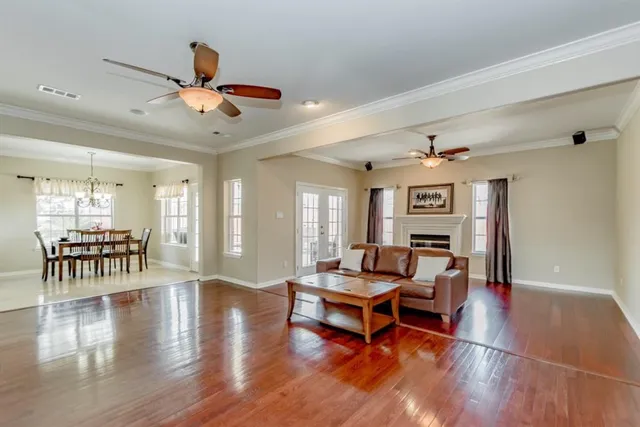 a living room with furniture and a table