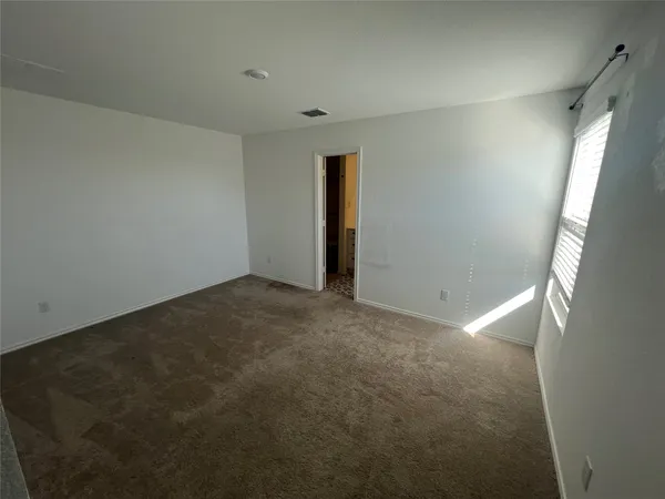 an empty room with an entryway